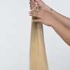 A medium beige blonde base, gently flowing into a natural golden blonde, interspersed with subtle light blonde highlights. This exquisite combination creates a sun-kissed, natural appearance,