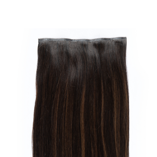 Rich brown depths, lit by caramel highlights. Its inherent glow is perfect for those with gold-toned strands or those eyeing gentle highlights. Think of it as the caramel twist to our Brown Ash Highlight.