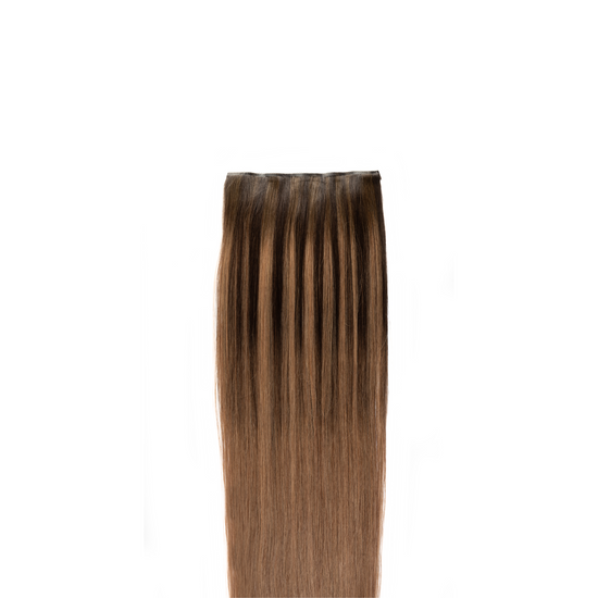 Starting with a deep, medium brown root seamlessly transitions into a sumptuous, rich caramel hue. This blend of shades evokes the warmth and sweetness of caramel, perfect for a luxurious and captivating look.