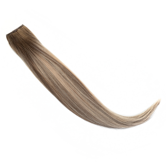 Dark beige blonde roots transition into creamy highlights, with a hint of lowlights for balance. A dream for those wanting their blonde bright and dimensional. It's a tad lighter than our Icy Blonde Highlight, with fewer lowlights and more brightness.