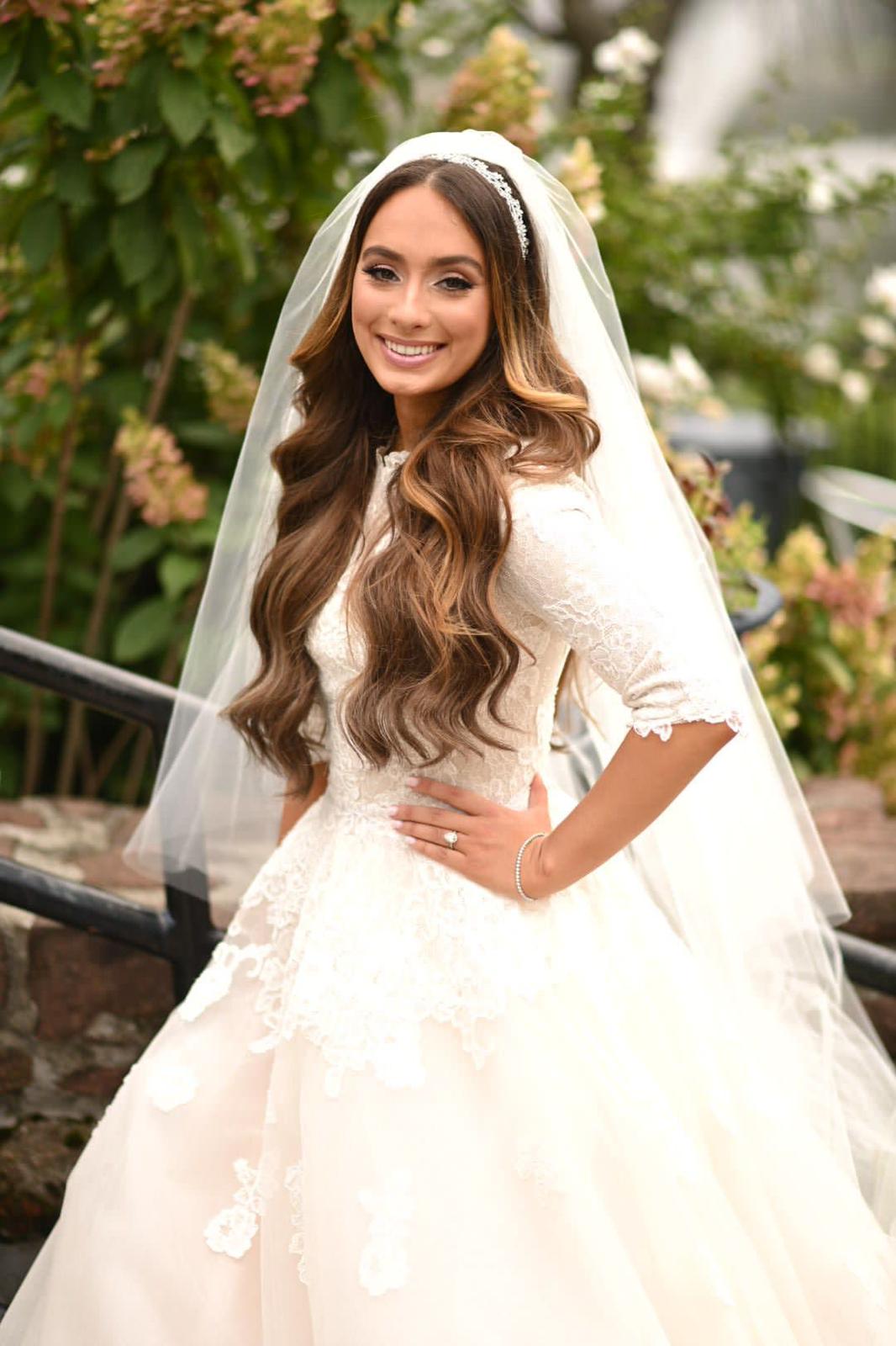 Beautiful bride with highlighted clip-in extensions