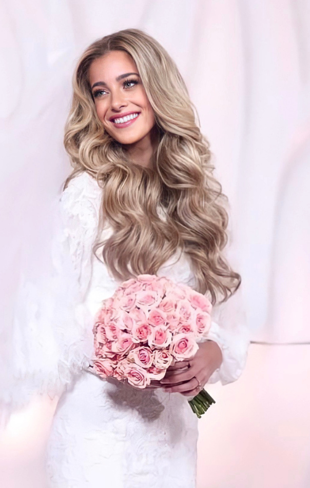 Beautiful bride with highlighted clip-in extensions