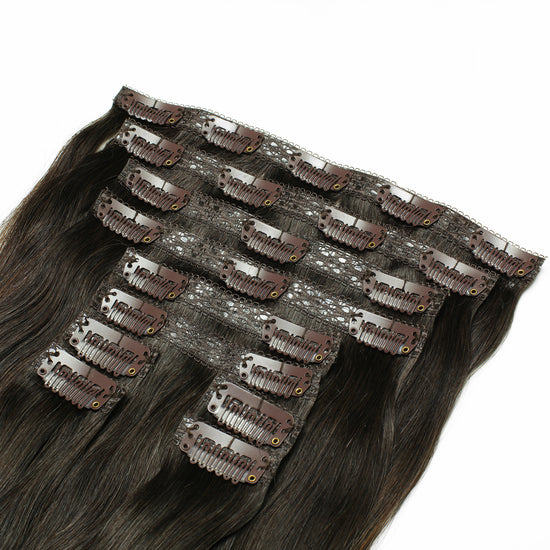 Backside of the 8 piece clip in hair extensions in the color Brown Caramel Highlight
